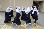 Мусульманский лидер выступает за ношение хиджаба в школах